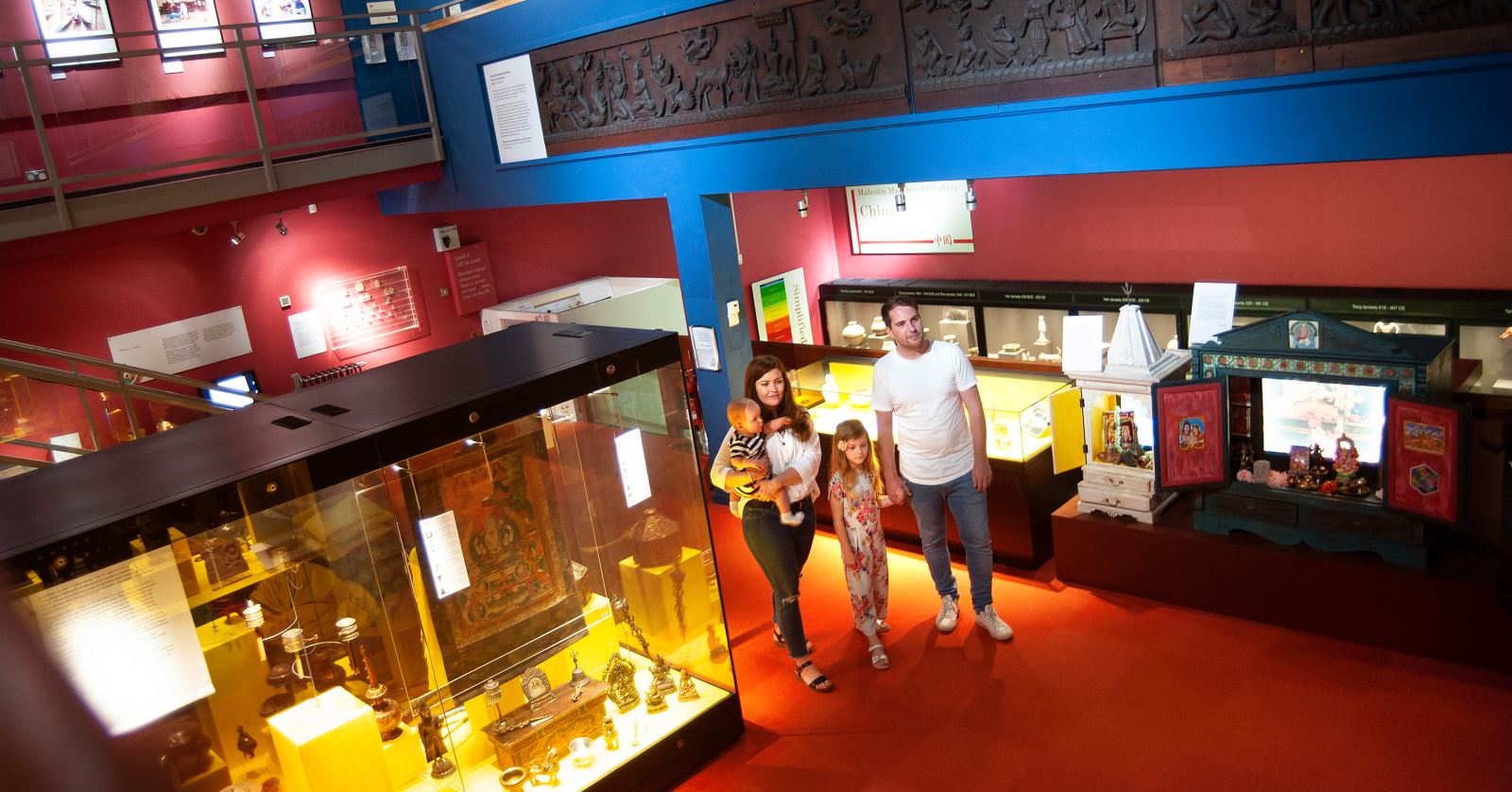 family walking through oriental museum
